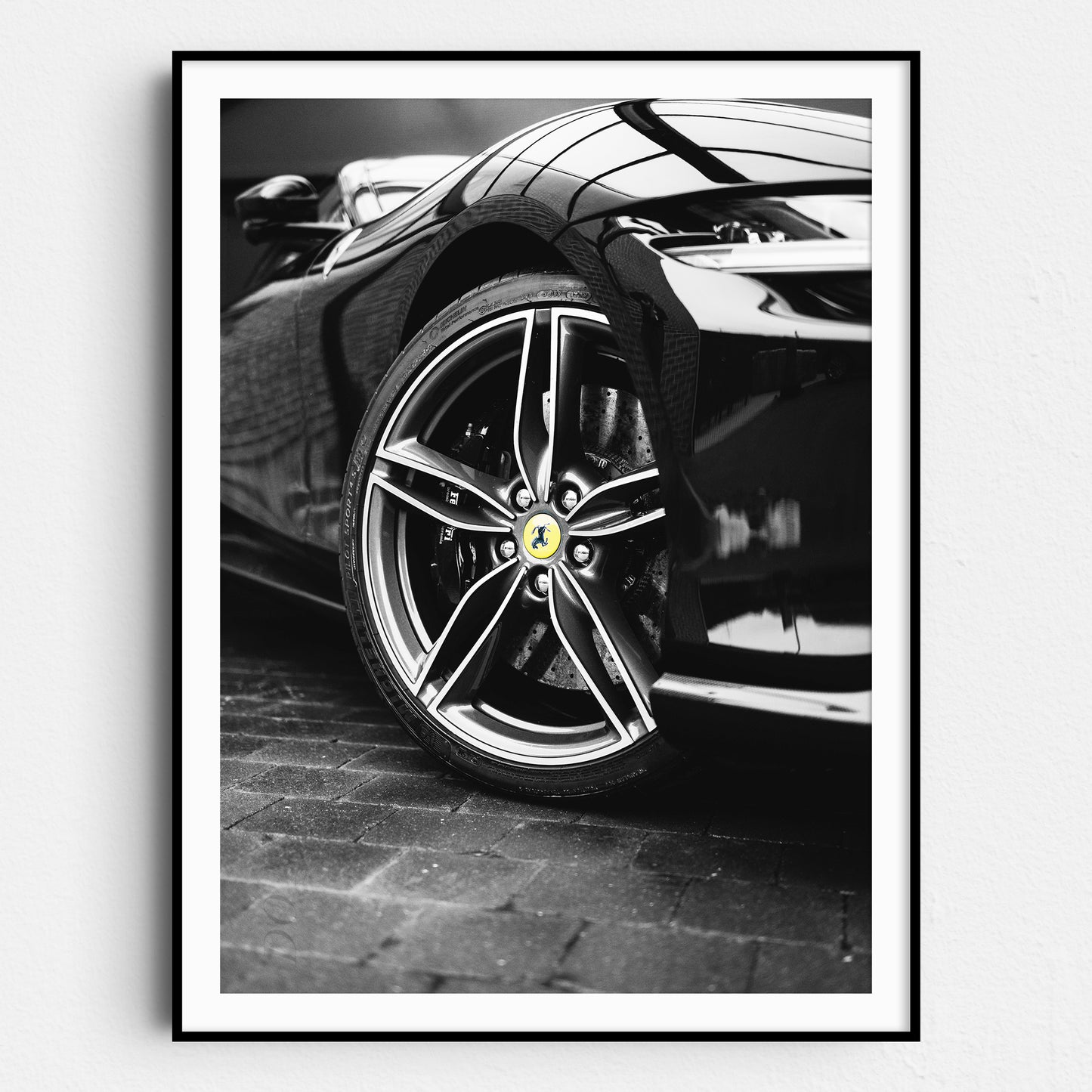 Yellow Ferrari Logo on Black & White