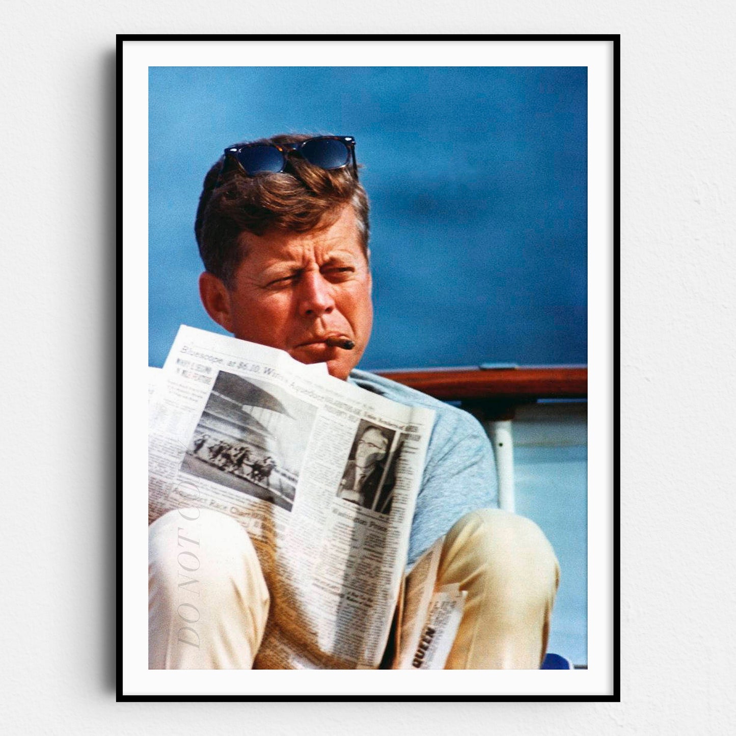 JFK Smoking A Cigar Reading The Newspaper