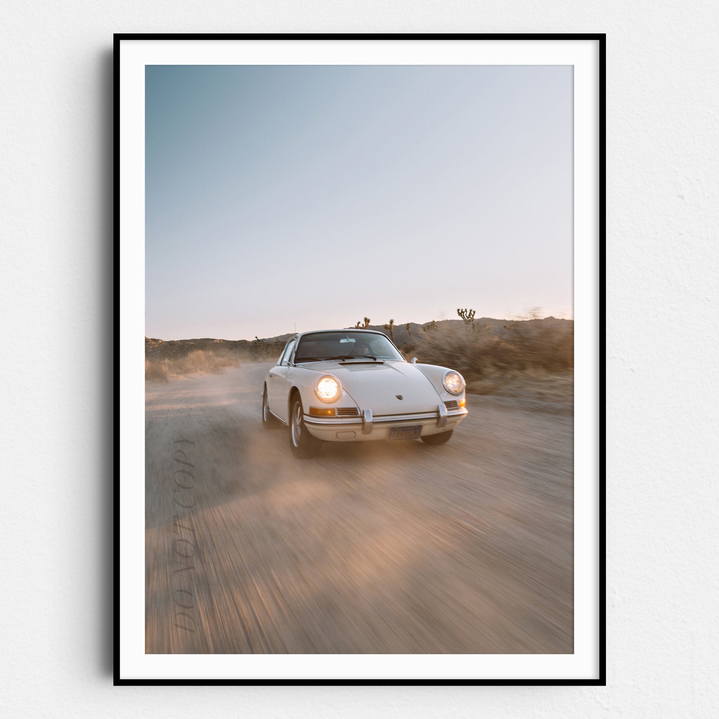 White Porsche 911 In Desert