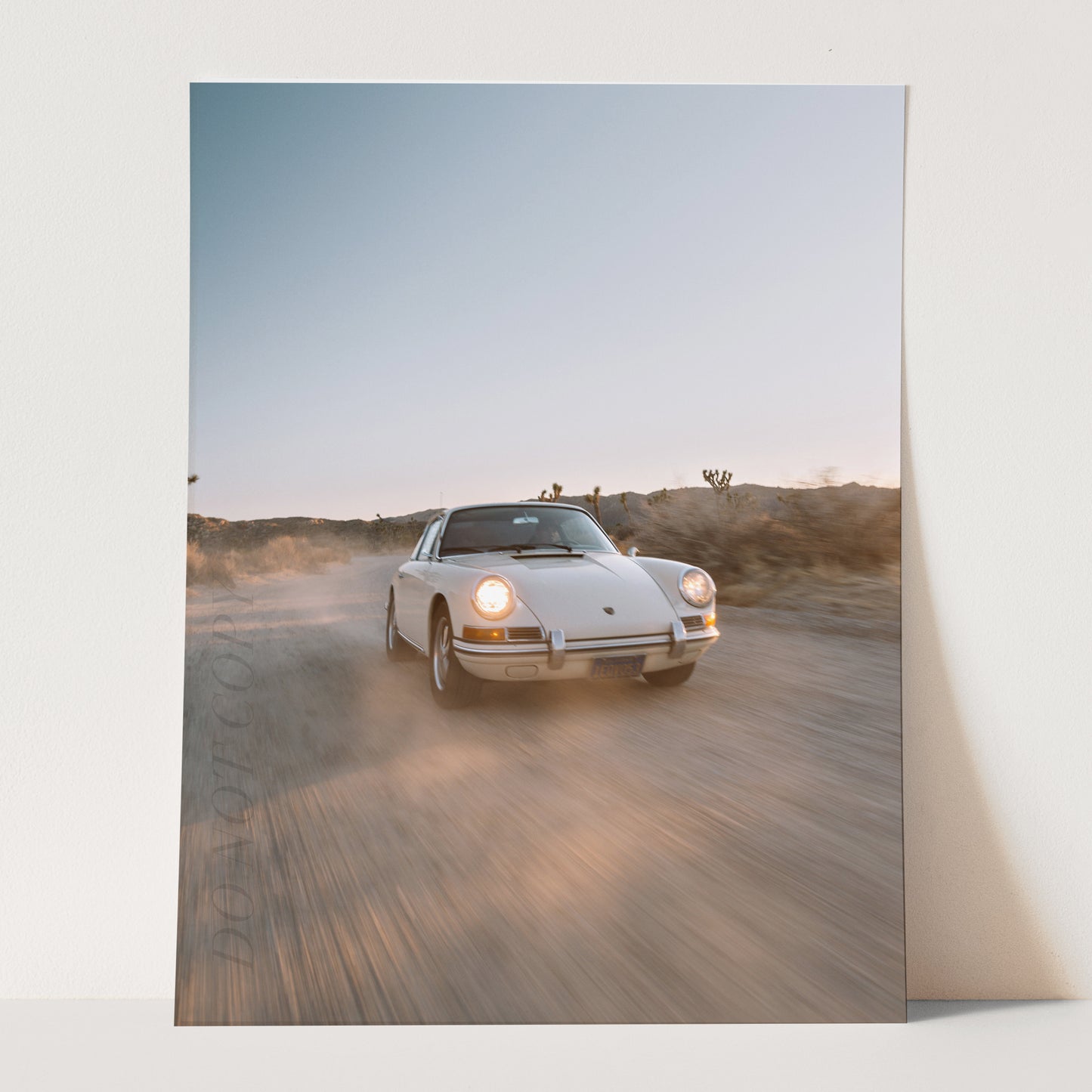 White Porsche 911 In Desert