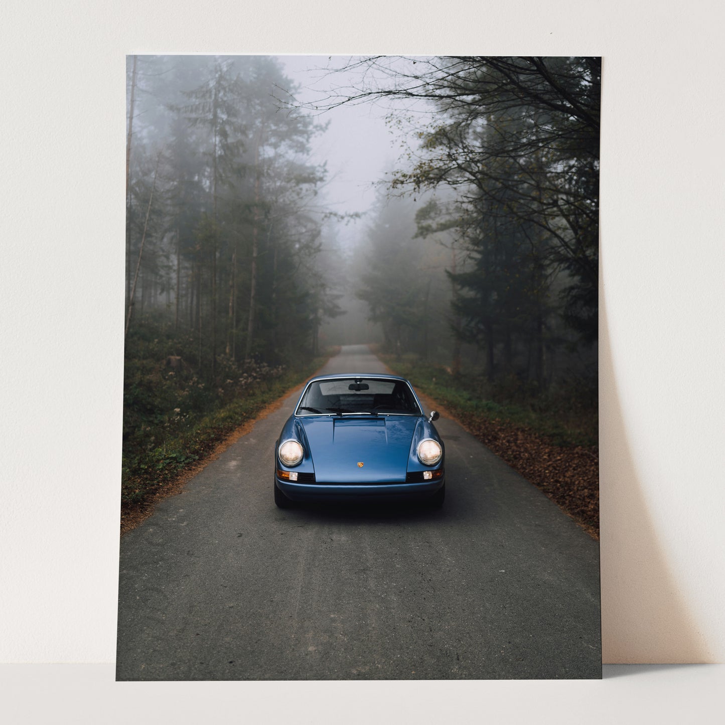 Vintage Blue Porsche in the Mist