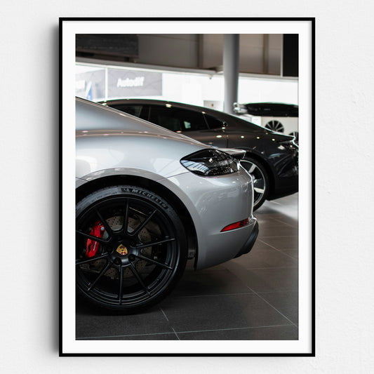 Silver Porsche in the Showroom