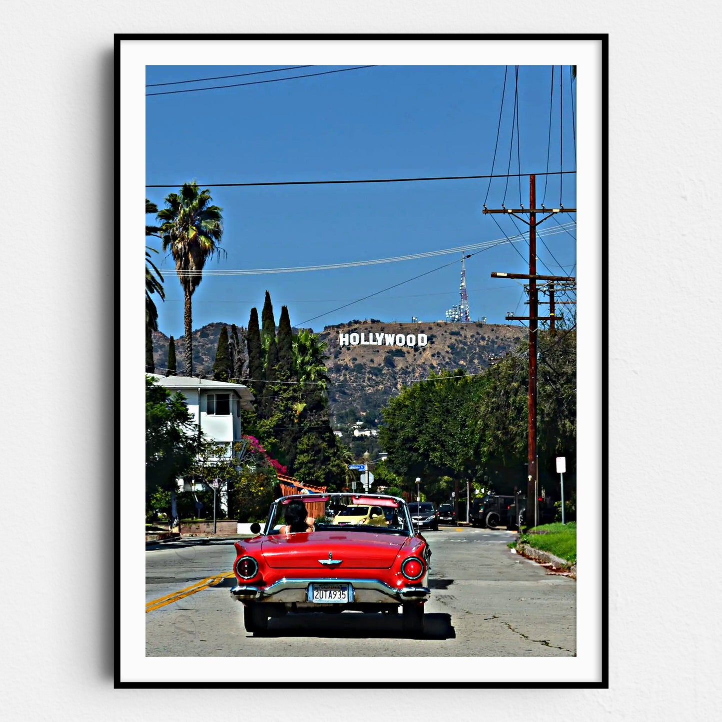 Red Convertible with Hollywood Sign