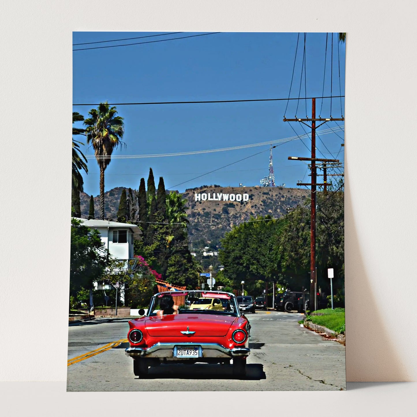Red Convertible with Hollywood Sign