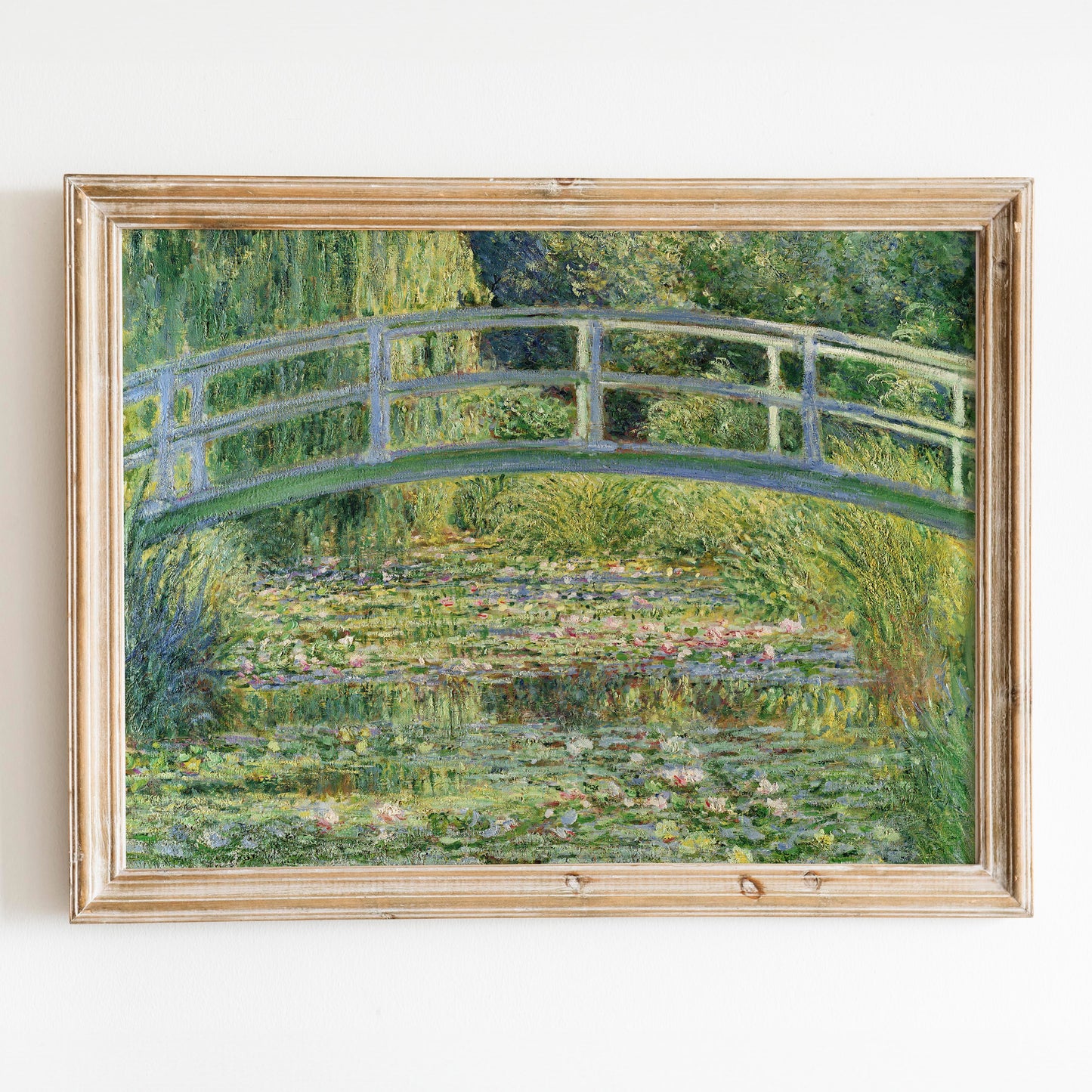 Bridge over a Pond of Water Lilies by Claude Monet