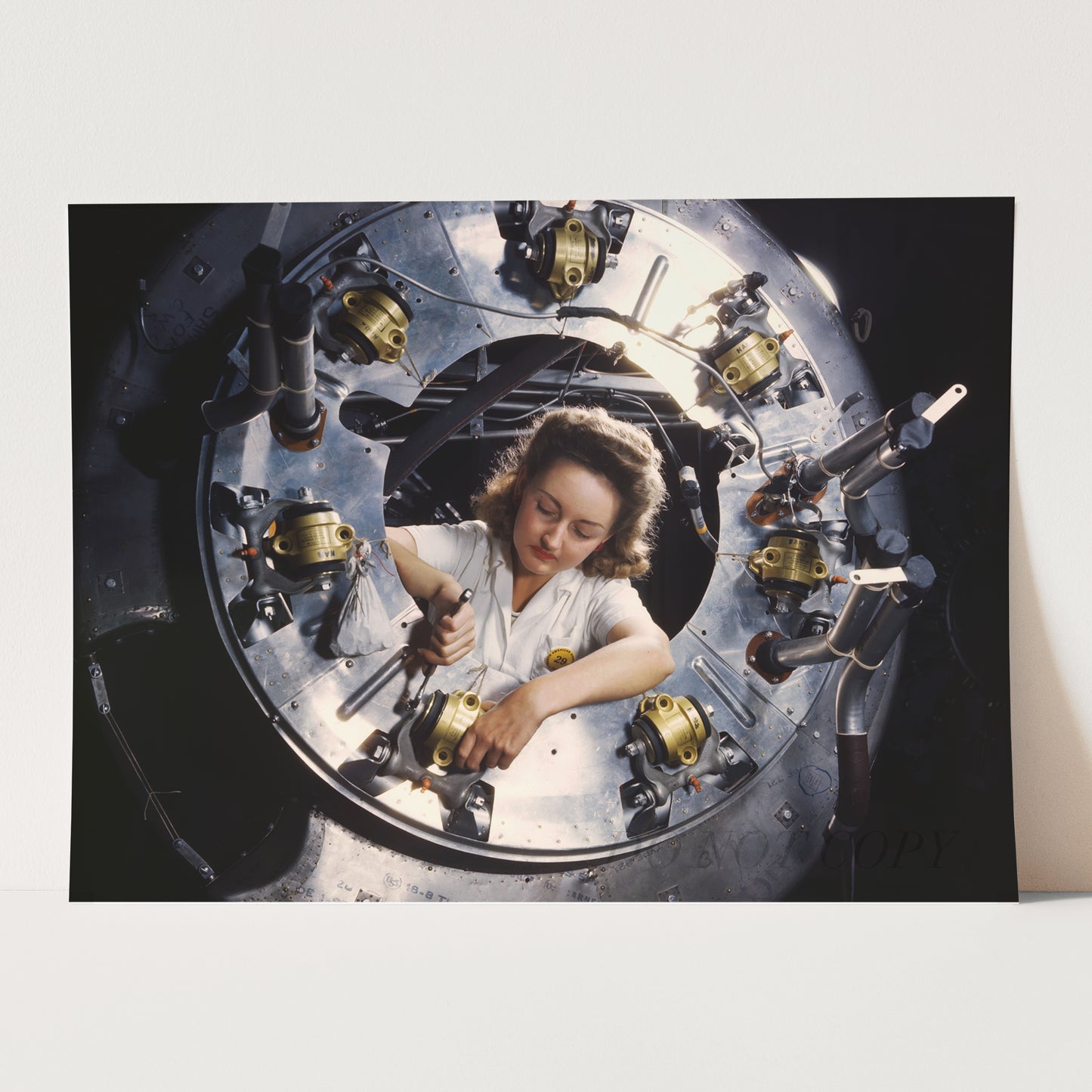 Woman Assembles a B25 Bomber Airplane, World War Two