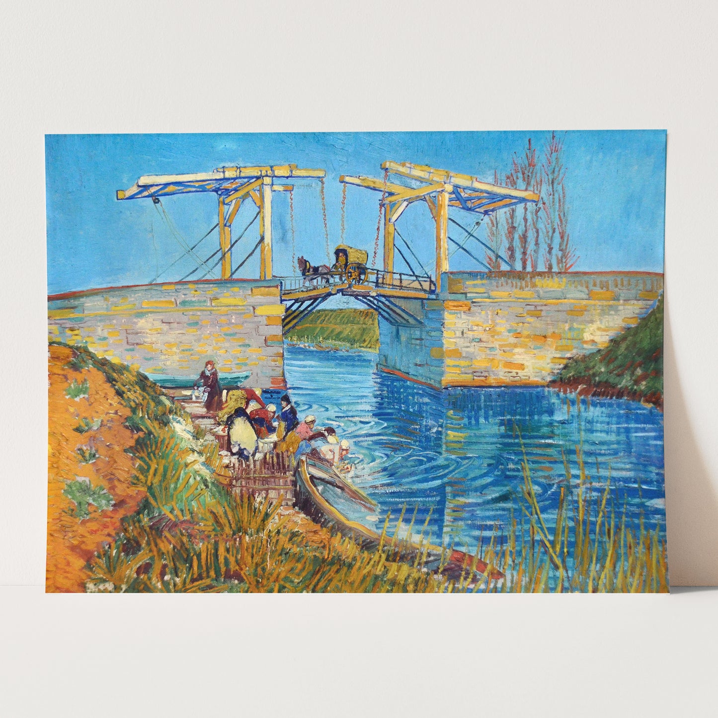 The Langlois Bridge at Arles with Women Washing (1888) by Van Gogh