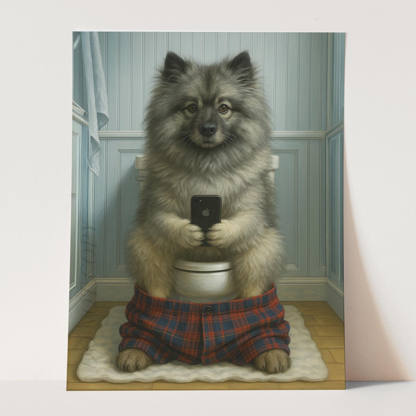 Keeshond Dog On The Phone On The Toilet