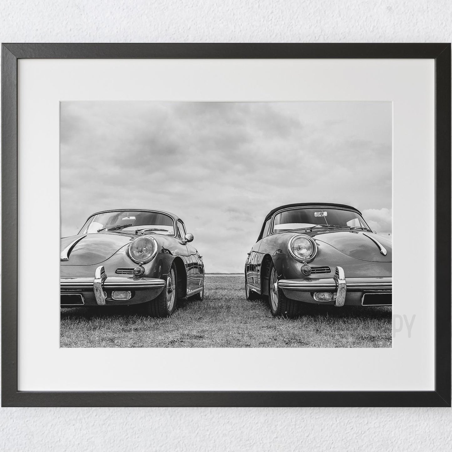 Two Porsche Speedsters Parked at the Field