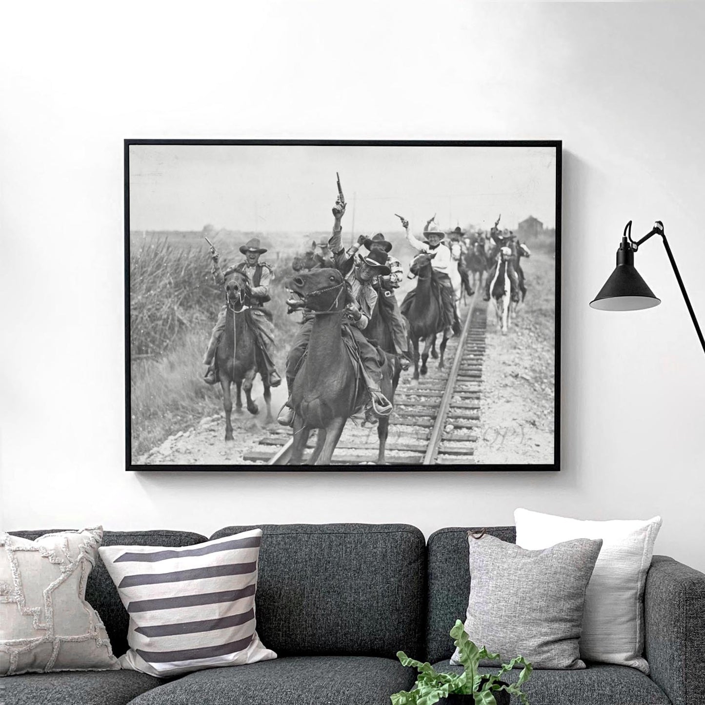 Cowboys Shooting Guns On Horseback