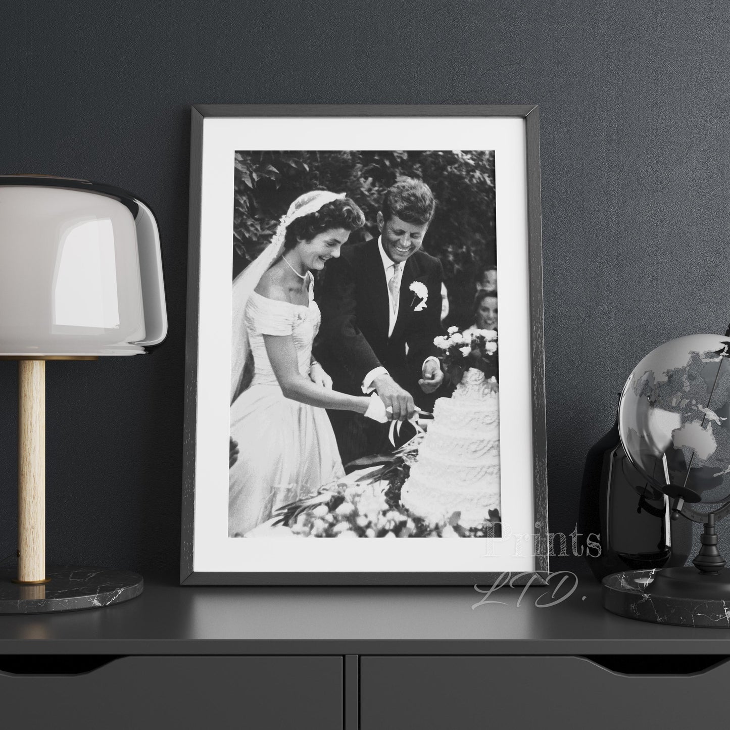 John F Kennedy (JFK) and Jackie Kennedy cutting cake at their wedding