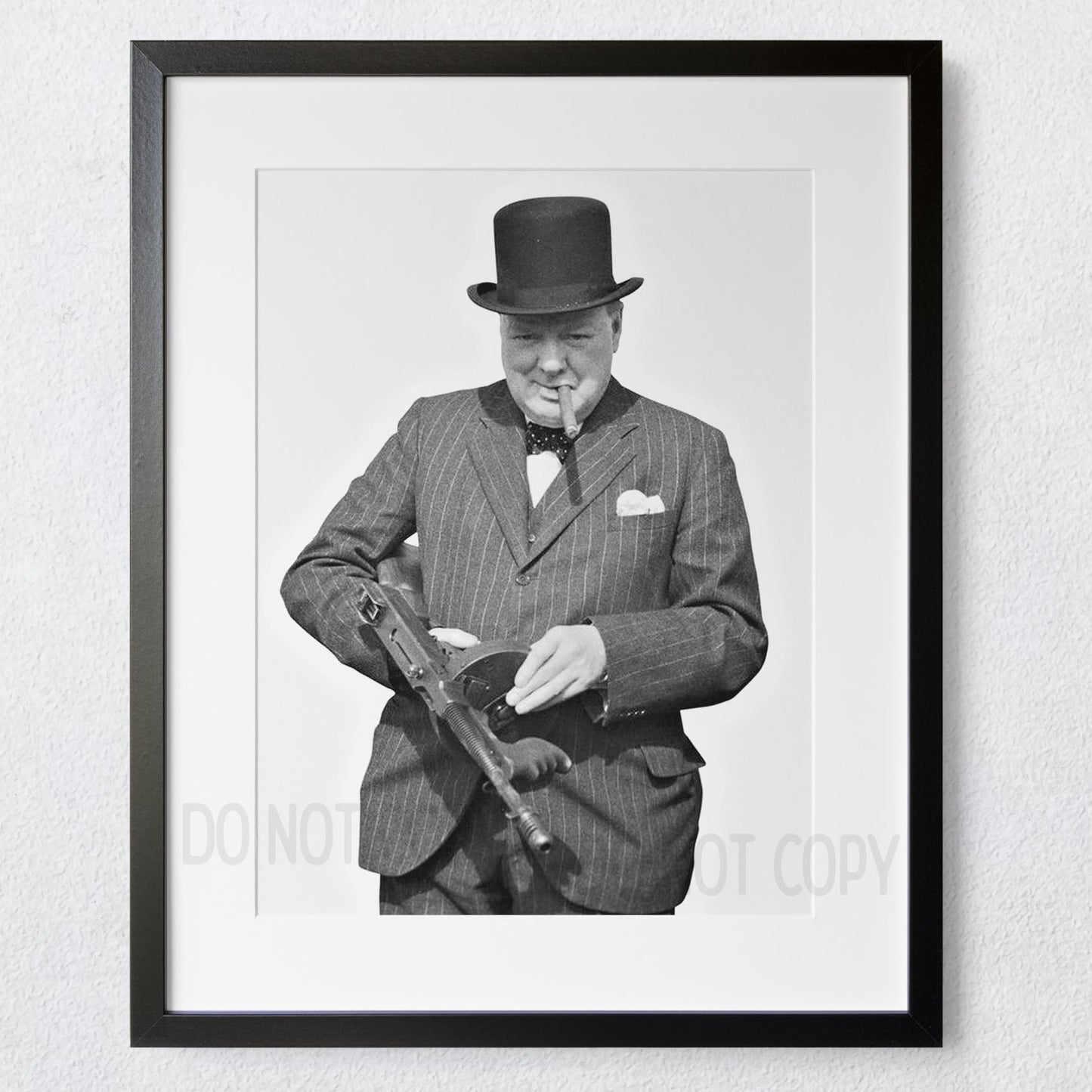 Winston Churchill with tommy machine gun