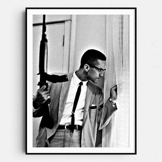 Malcolm X With Machine Gun