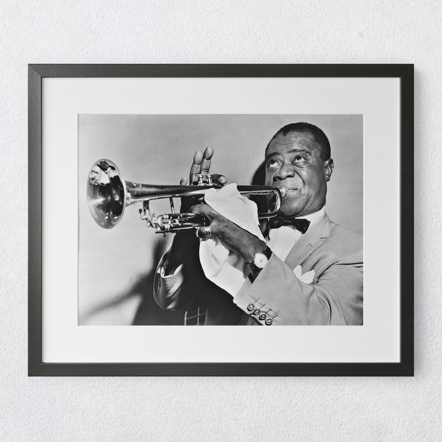 Louis Armstrong playing the trumpet