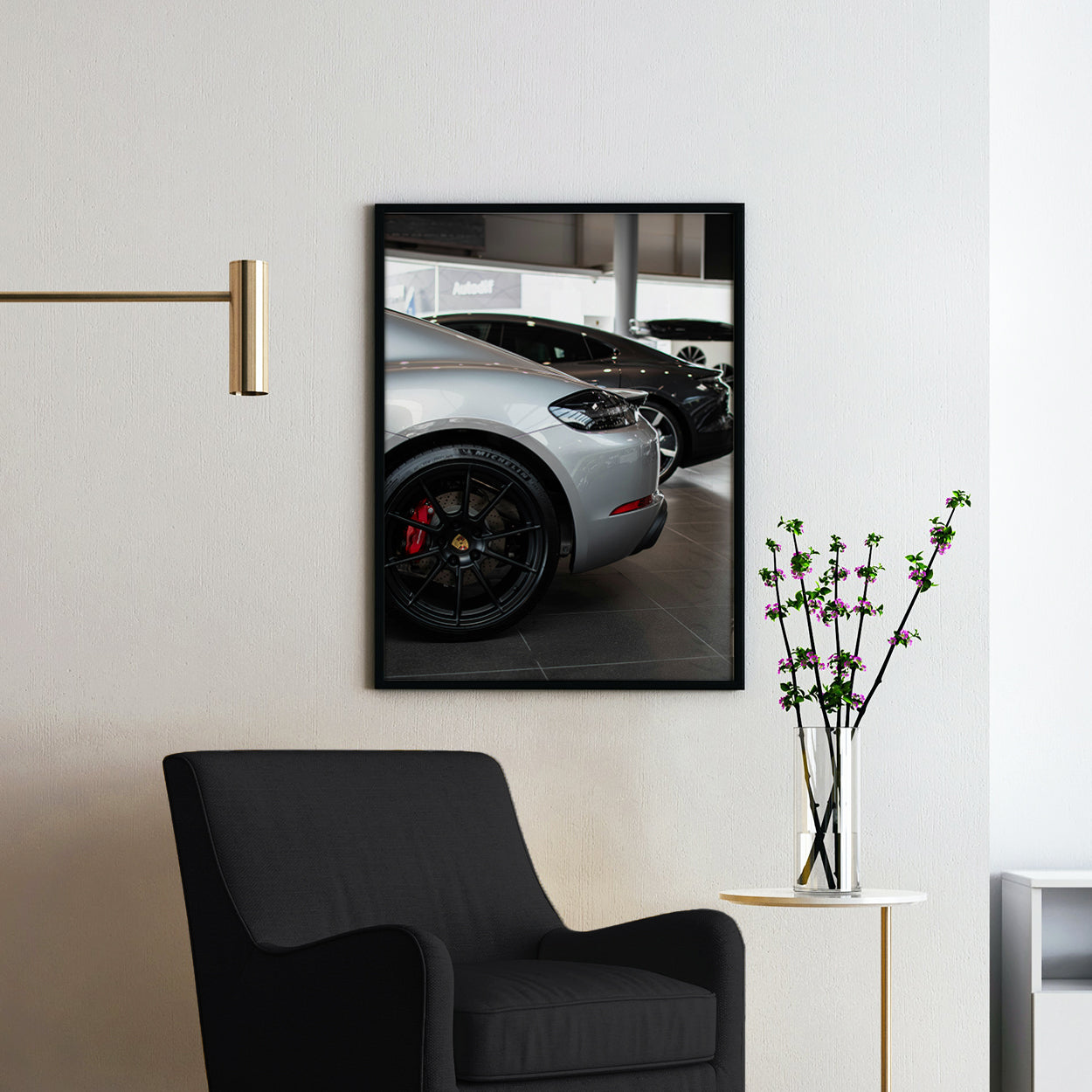 Silver Porsche in the Showroom