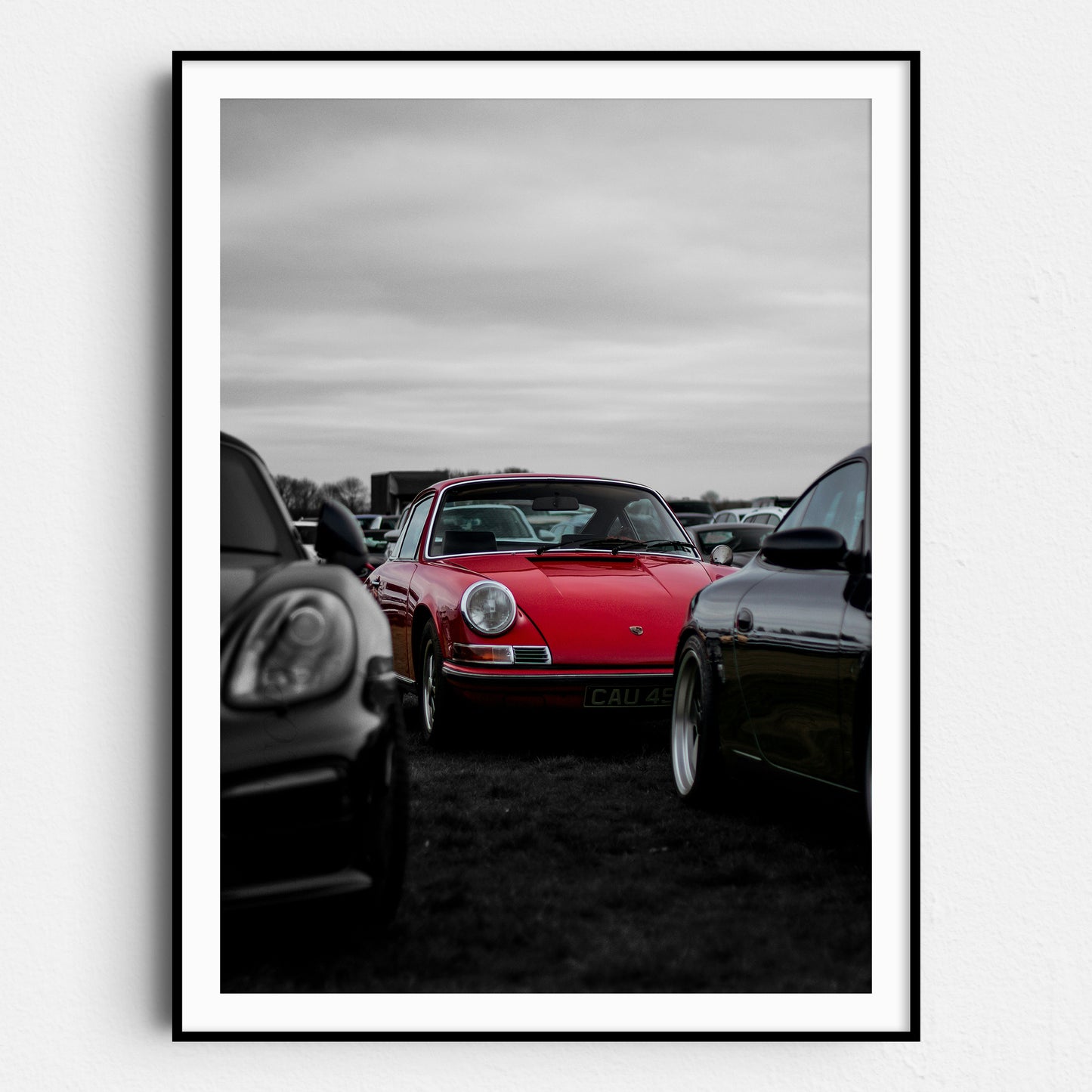 Red Porsche in a Field of Black & White