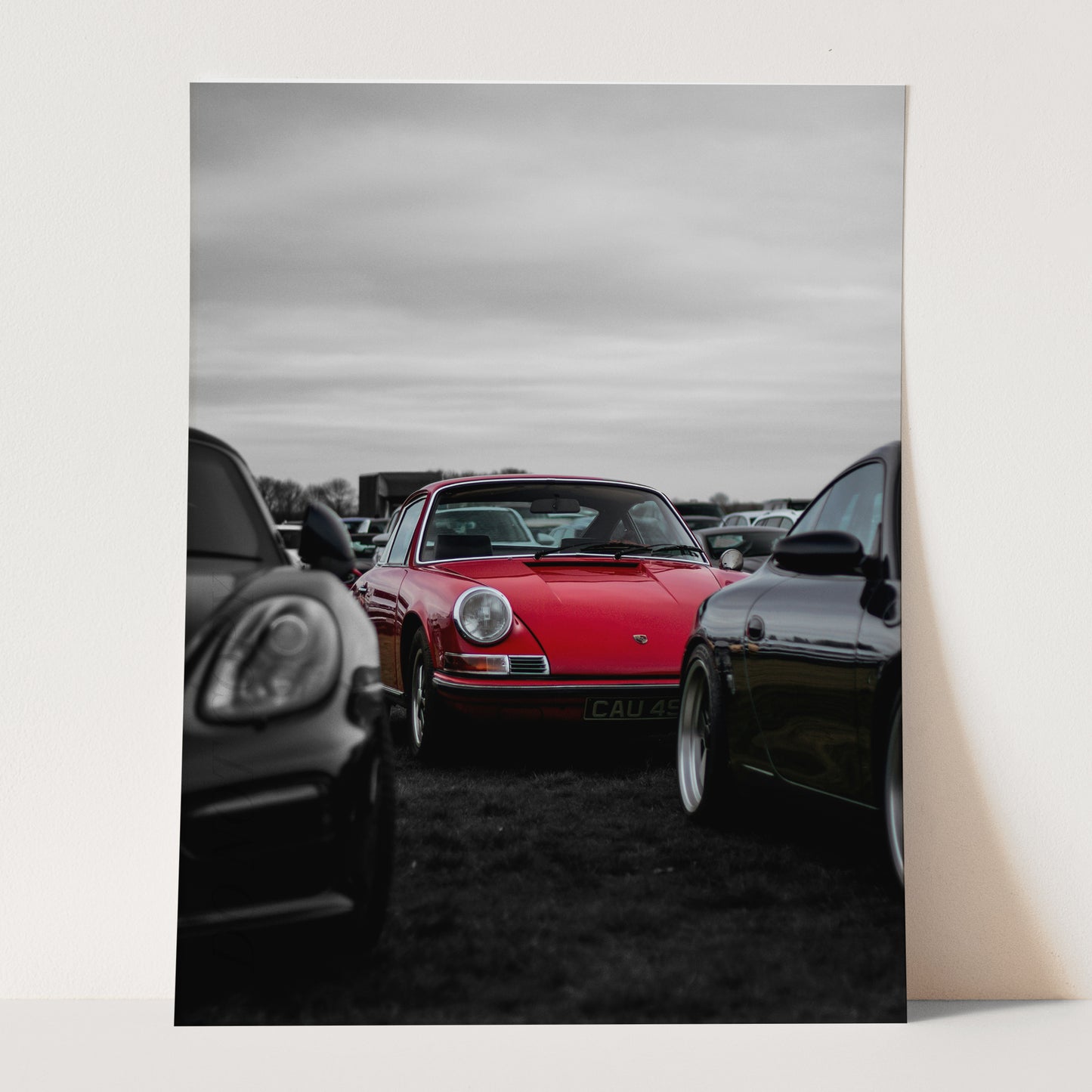Red Porsche in a Field of Black & White