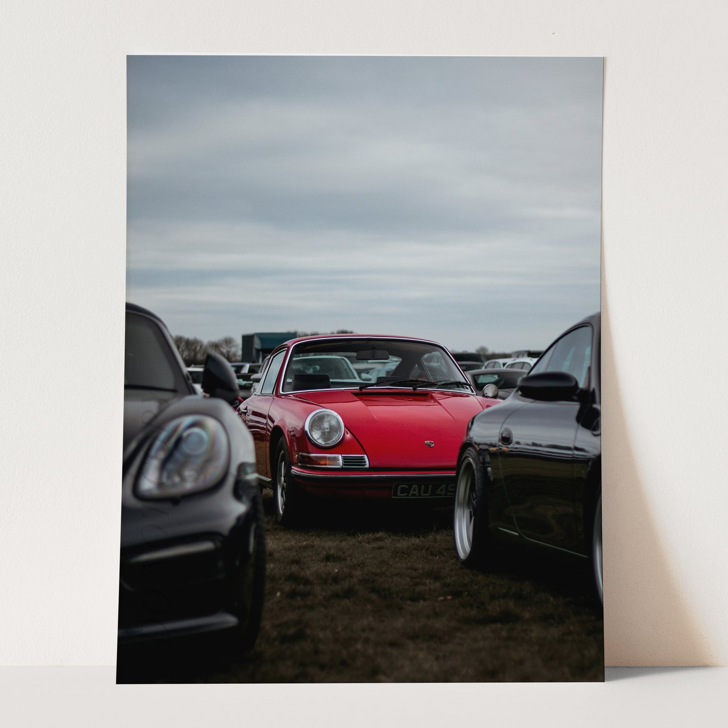 Red Porsche in a Field