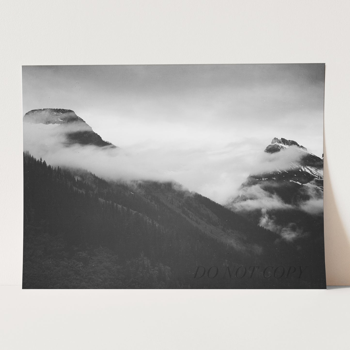 In Glacier National Park, Mountain With Clouds by Ansel Adams