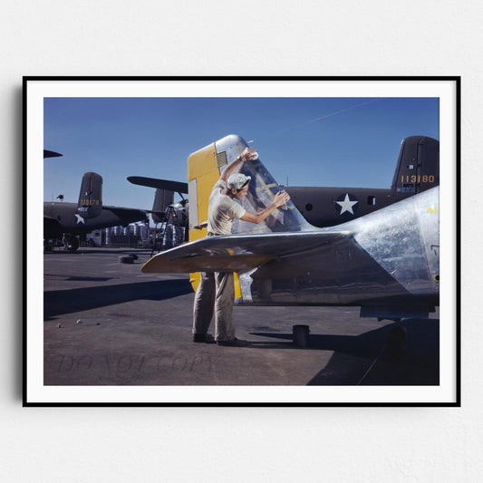 Cleaning the Tail of a P51 Fighter Plane, World War Two
