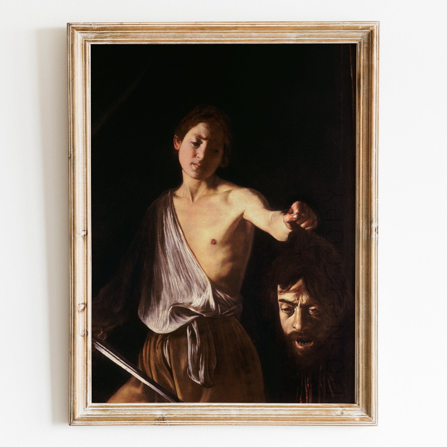 David with the Head of Goliath by Caravaggio