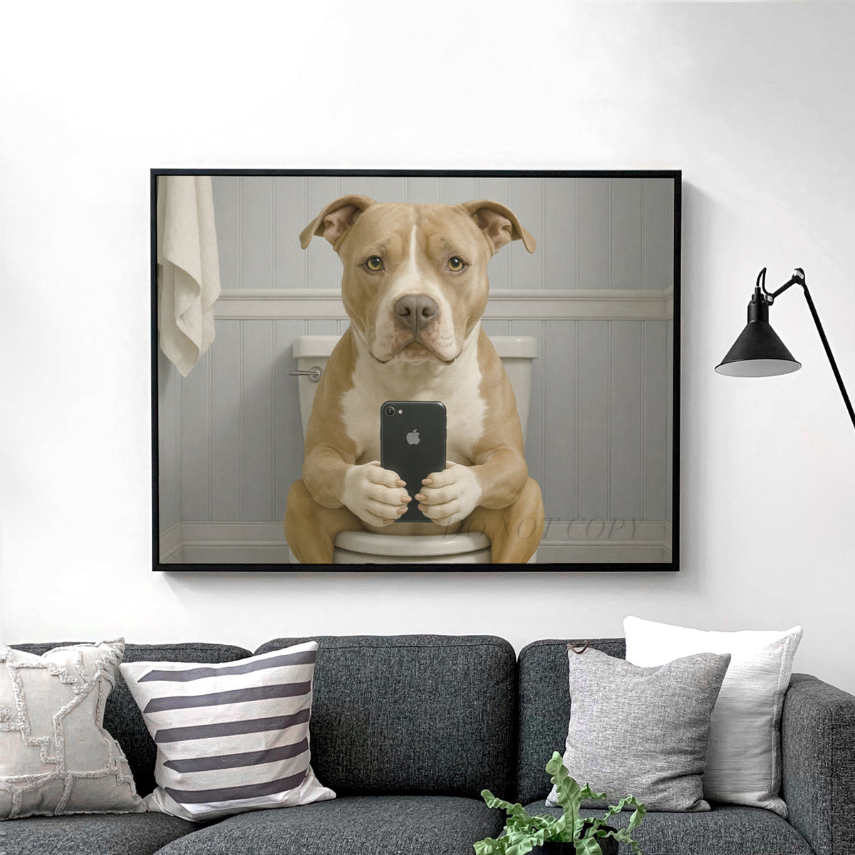 American Pit Bull Terrier Dog On The Phone On The Toilet