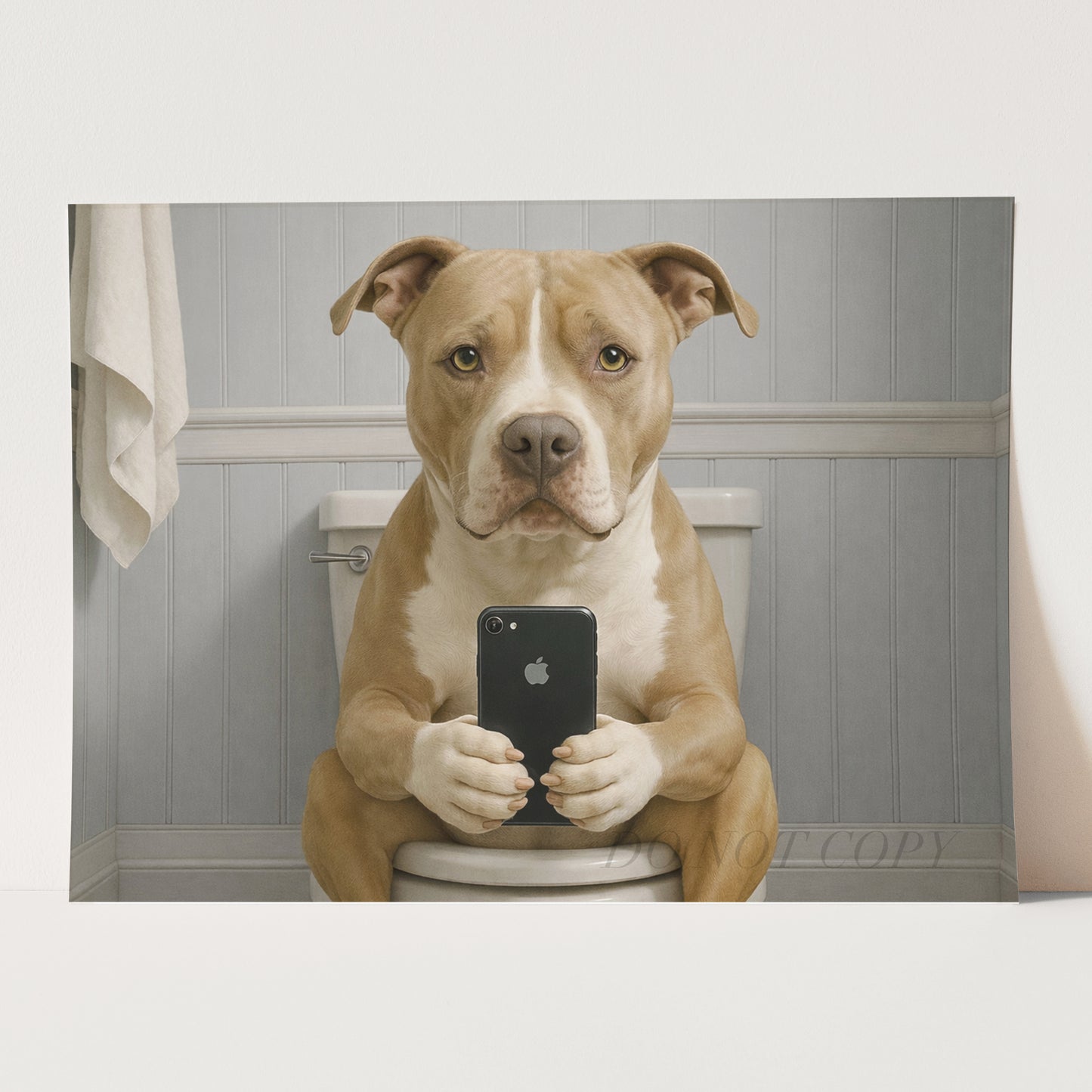 American Pit Bull Terrier Dog On The Phone On The Toilet