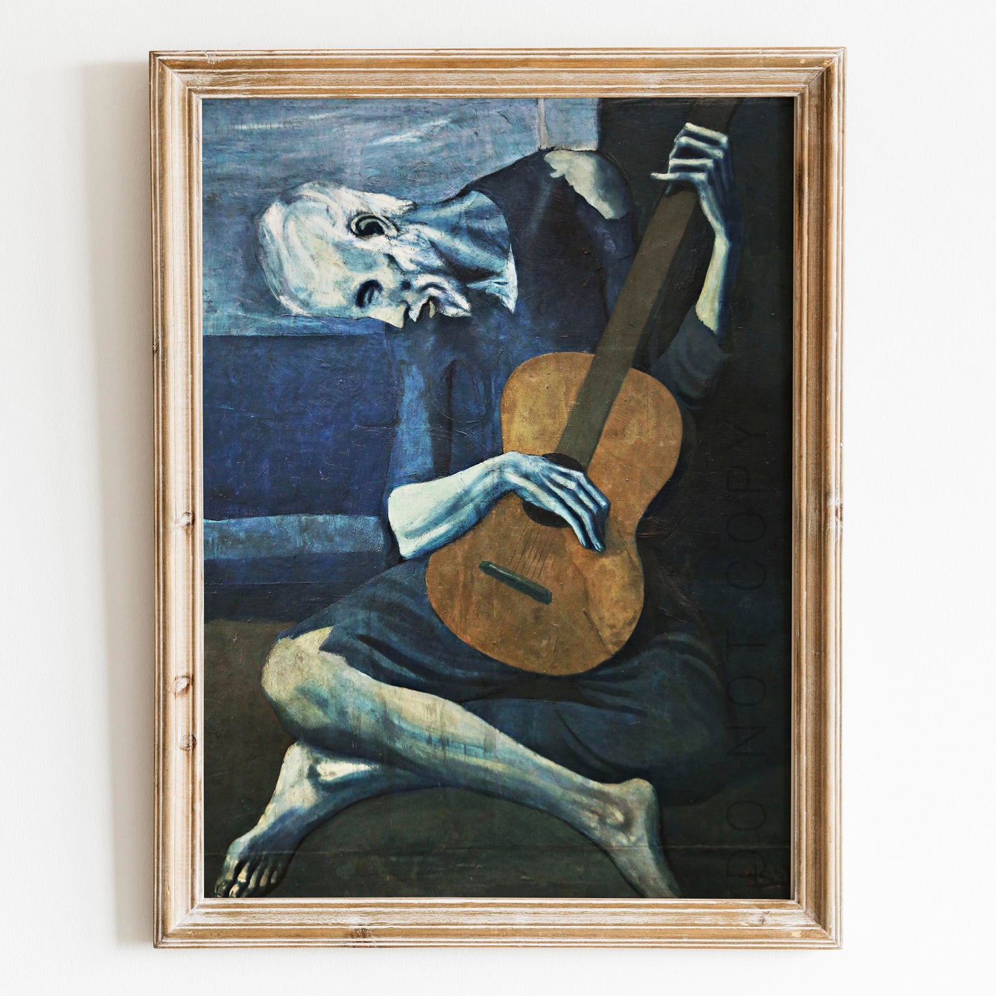 Old Guitarist by Pablo Picasso