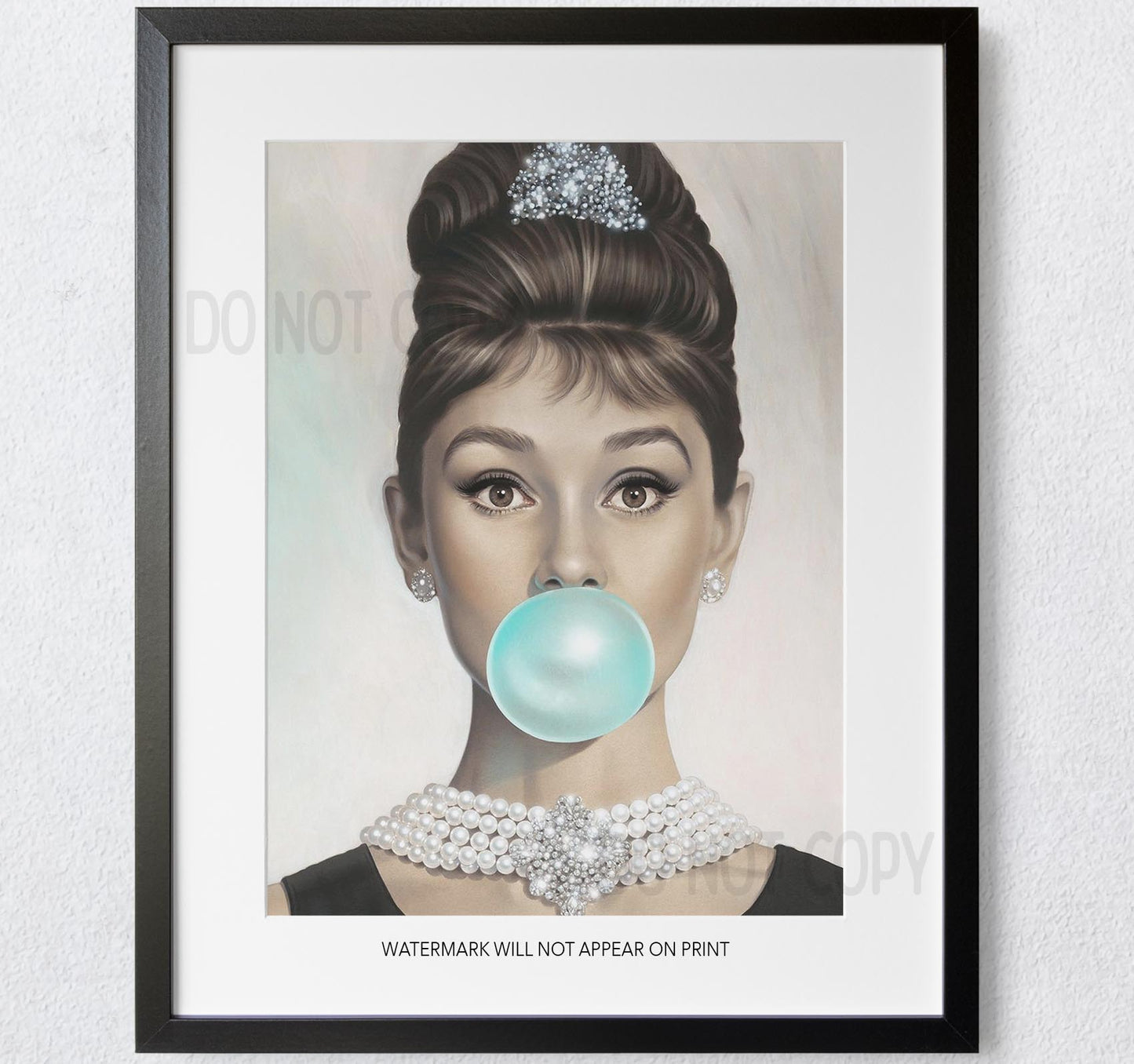 Audrey Hepburn Blowing Bubble Gum