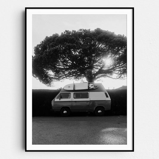 Old Van With Surfboard By Beach